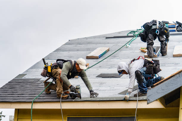 Professional Storm Damage Roof Repair technician working in Hempstead, NY